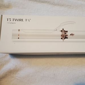 New in box T3 curling iron
